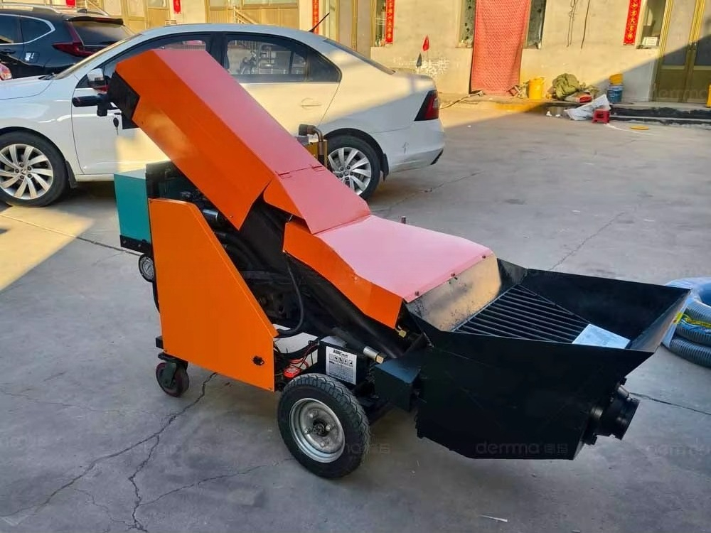 آلة رش الخرسانة والأسمنت والمل - مراجعة Concrete Mixer Machine وسعره
